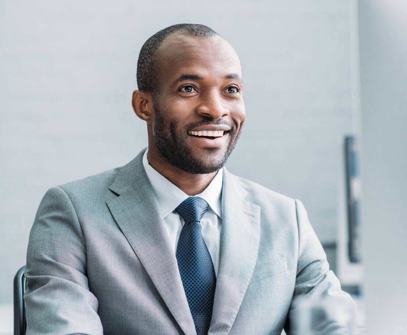 portrait-of-smiling-african-american-businessman-w-2024-11-18-10-23-22-utc